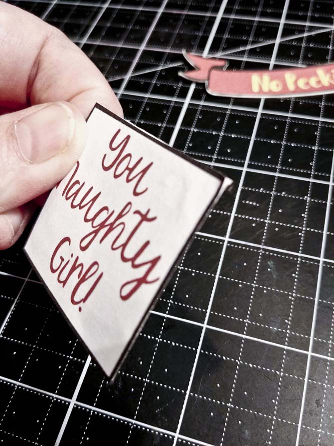 Glue-naughty-sign-onto-cardstock_1